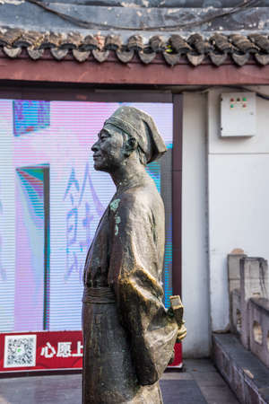 Statue Tangyin, a Chinese scholar, painter, and poet of the Ming period whose life story has become a part of popular lore, Located in Nanjing, China.のeditorial素材