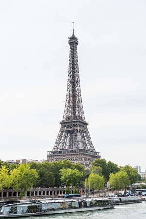 The Eiffel Tower at the bank of Seine River, a wrought-iron lattice tower on the Champ de Mars in Paris, France, named after the engineer Gustaveのeditorial素材