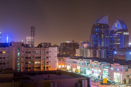 Aerial night view with neon light of Riyadh with Twin building of Alinma Bank in Riyadh, Saudi...