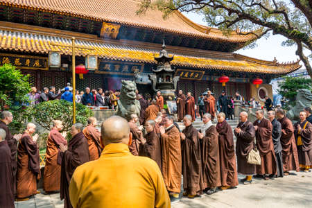 Monks in the ceremony of Puji Temples in the Putuoshan, Zhoushan Islands, Zhejiang, considered the bodhimanda of the bodhisattva Avalokitesvara (Guanyin)のeditorial素材