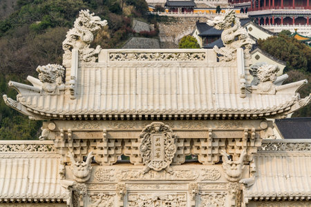 A Chinese traditional gate of Buddha tower in the Putuoshan, Zhoushan Islands, a renowned site in Chinese bodhimanda of the bodhisattva Avalokitesvara (Guanyin)の写真素材