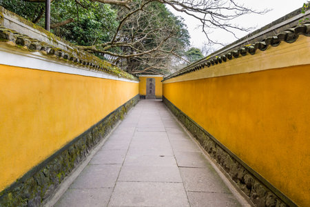 A Chinese traditional Buddha Huiji Temple in the Putuoshan, Zhoushan Islands, a renowned site in Chinese bodhimanda of the bodhisattva Avalokitesvara (Guanyin)の写真素材