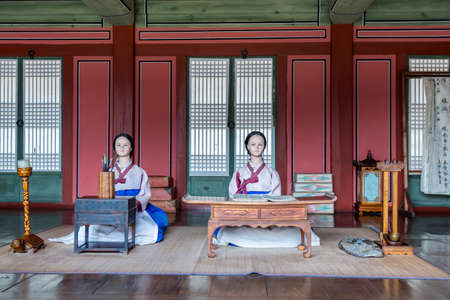 Mannequins of people dressing traditional clothes studying in the school of the Hwaseong Haenggung...