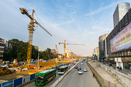Skylines and construction site with crane at the Guanggu, Wuhan City of China.のeditorial素材