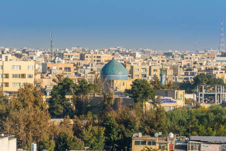 Aerial view of residential building skyline with blue tome of Lonban Mosque of Isfahan of Iran, one of the most famous historic city in the middle east.のeditorial素材