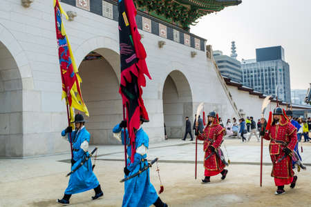 Warriors of the Royal guard in historical costumes in daily Ceremony of Gate Guard Change at Gwanghwamun Gate near Gyeongbokgung Palaceのeditorial素材