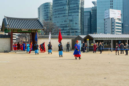 Warriors of the Royal guard in historical costumes in daily Ceremony of Gate Guard Change near the Gwanghwamun, the main Gate of Gyeongbokgung Palaceのeditorial素材
