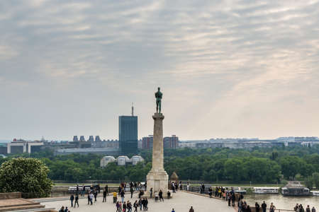 Tourist at the square of Victor monument in Kalemegdan fortress Belgrade under sunset, Belgrade,...