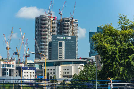 Street view with modern building under construction in the downtown of Tel Aviv City. Israelのeditorial素材