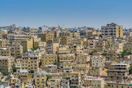 Cityscape of Amman with numerous buildings, the capital and most populous city of Jordan, view from Amman Citadel, known in Arabic as Jabal al-Qal'a.のeditorial素材