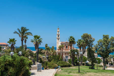 Bell tower and facade of the Saint Peter Church, Franciscan church in Old Jaffa in Tel Aviv Yaffo, Israel, View from the top of the hill in Jaffa old city.のeditorial素材