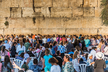 Lots of female Jewish at The Western Wall, Wailing Wall, or Buraq Wall, Women section, an ancient...