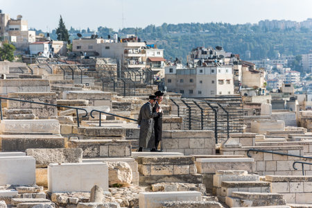 Orthodox Jewish in graveyard at the Mount of Olives near the Kidron Valley or King's Valley,on the...