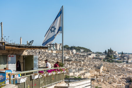 Tourists information center with Israeli National flag at the Kidron Valley or King's Valley, on the...