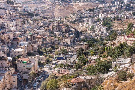 Residential houses at the Mount of Olive and Kidron Valley under the sunlight in the morning in...