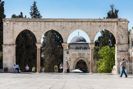 Arched South gateway with Siliver dome of Al-Aqsa Mosque at the square of Golden Dome of the Rock, in an Islamic shrine located on the Temple Mount in the Old City Jerusalem, Israelのeditorial素材