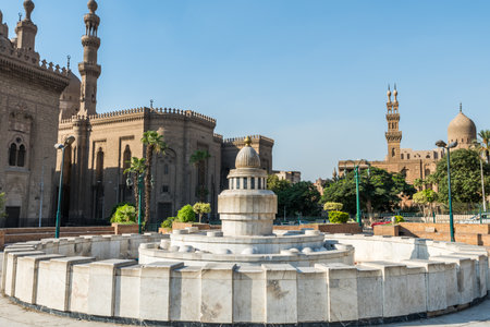 Fountain and Salah El-Deen square and and background of Qanibay al-Rahman Mosque, Mosque of Madrassa of Sultan Hassan and the Mosque of Al Rifaiのeditorial素材