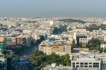 Aerial view of cityscape with crowded buildings of Athens in a sunny day in Greeceのeditorial素材