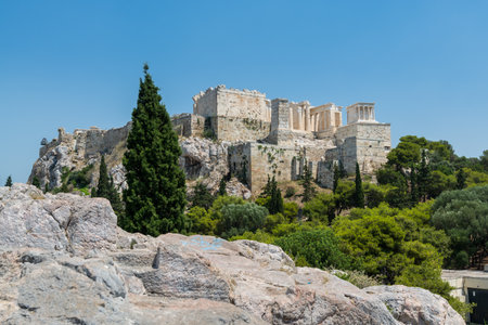Ruins of Acropolis with Parthenon, Erechtheum, Beule Gate and Temple of Athena in the city center, view from Areopagus-Hillの写真素材
