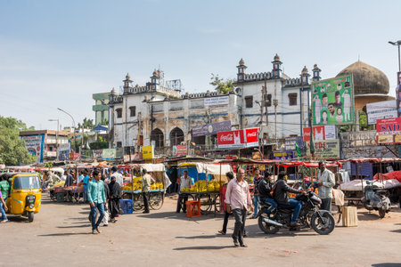 busy local markets surrounding the Charminar, a monument and mosque located in Hyderabad, Telangana, Indiaのeditorial素材