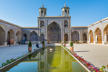 Tourists in the Nasir-Al-mulk Mosque (Pink Mosque), well known as considerable pink colour tiles for its interior designのeditorial素材