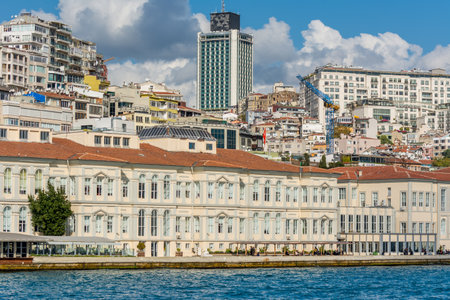 Cityscape of Golden horn with ancient and modern buildings in Istanbul Turkey from the Bosphorus strait on a sunny day with background cloudy skyのeditorial素材
