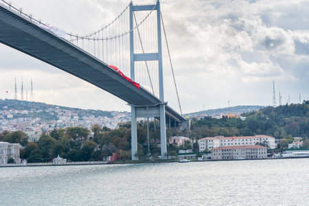 Bosphorus Bridge with background of Bosphorus strait on a sunny day with background cloudy blue sky and blue sea in Istanbul, Turkey. Blue Turkey concept.の写真素材