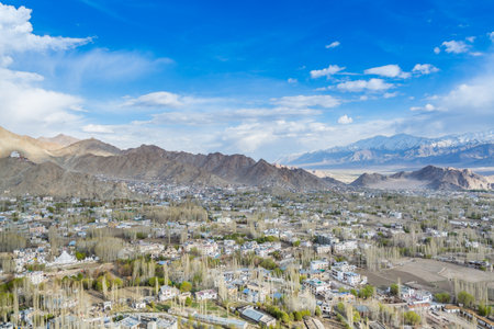 Aerial view of Leh Ladahk City of Kashmir with background of Himalaya mountain against blue sky, view from the Shanti Stupaの写真素材