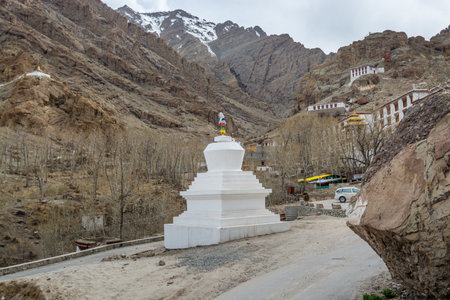 Tibetan traditional pagoda and village at the Hemis monastery with background of barren mountains in Leh, Ladakh, Jammu and Kashmirのeditorial素材