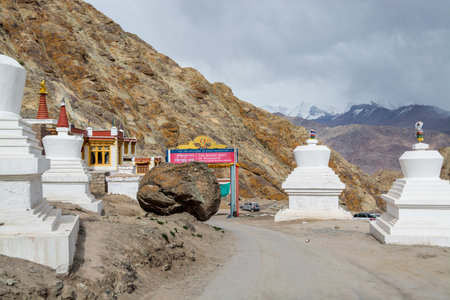 Tibetan traditional pagoda and village at the Hemis monastery with background of barren mountains in Leh, Ladakh, Jammu and Kashmirのeditorial素材
