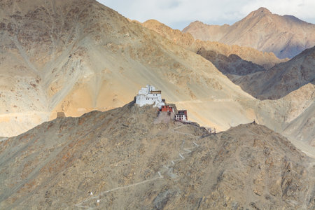 Namgyal Tsemo Monastery with background of Himalayas mountains and beautiful evening light, view from Shanti Stupa, Leh, Ladakh, India controlled Jammu and Kashmirのeditorial素材