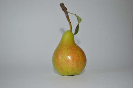 A pear with a green apple. High quality photoの写真素材