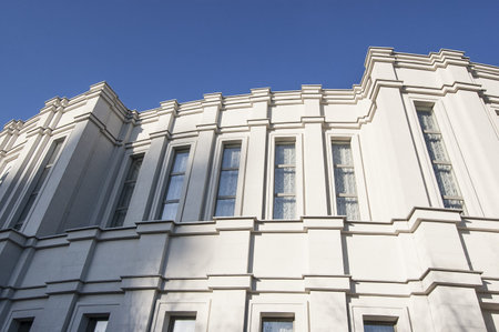 Facade of the building shot in perspective. Architectural style - Constructivism 