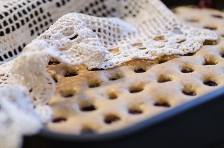 Homemade cherry pie with a knitted cloth. From the series Homemade Cherry Pieの写真素材