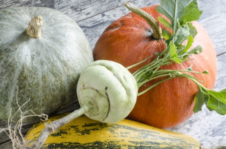 Fresh vegetables on old wooden table, macro. From the series "Autumn vegetables"の写真素材
