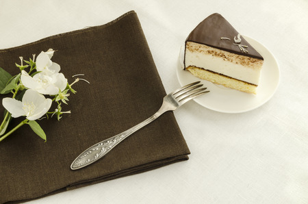 Piece of cake, decorated with jasmine flower From series elegant dessertsの写真素材