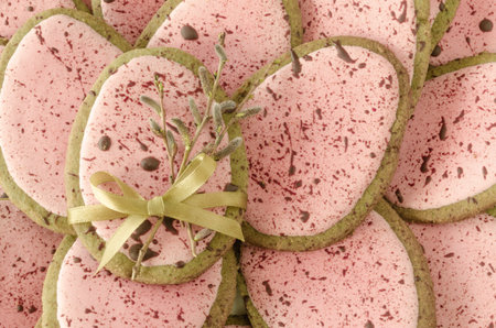 Homemade Easter cookies in shape of egg. Vintage style background.