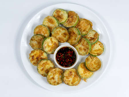 Korean food: Hobakjeon. Zucchini sliced, flour-coated, and pan-fried in egg batter.の写真素材