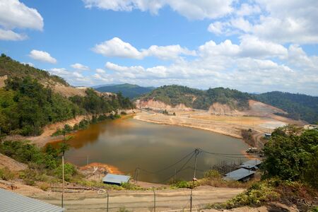 An excavated pit at mining industry.の写真素材