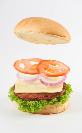 A burger layer with empty space left for ingredients add on during late stage edit.の写真素材