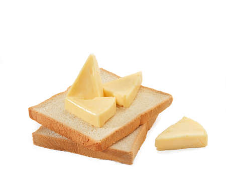 cheese and slice bread at white backgroundの写真素材