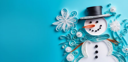 Banner with white quilling snowman closeup on blue background, top view. Merry Christmas and Happy New Year holiday concept.の素材