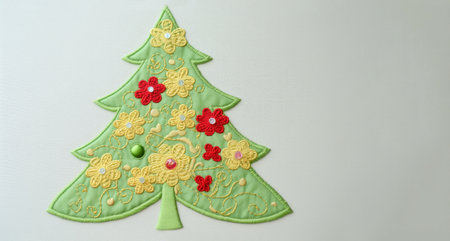 Banner with christmas tree applique with space for text. Christmas tree made of fabric isolated on white background. Handmade christmas tree, winter craft. Creative christmas concept.の素材