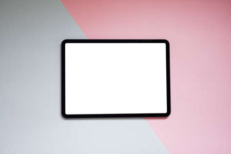 Top view image of white blank screen computer tablet on table two toneの写真素材