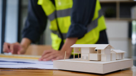 Engineer working on table and explain to customers.