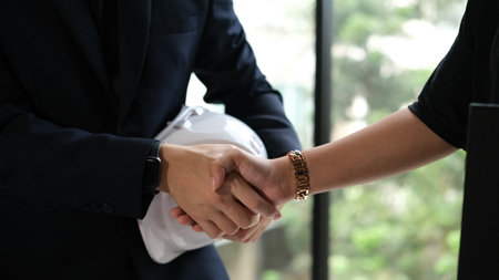 Construction team shake hands greeting start new project plan.の写真素材
