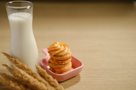homemade cookies and a glass of milk on the table..の写真素材