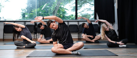 Group Of People performing yoga class ,sports and healthcare concept..