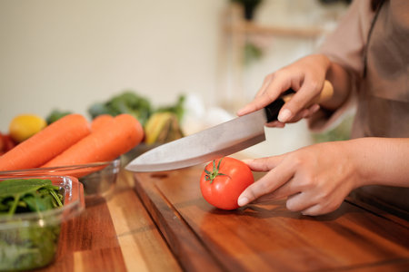 Cooking scene of woman preparing vegetables, home kitchen environment, cooking, woman, vegetables,...