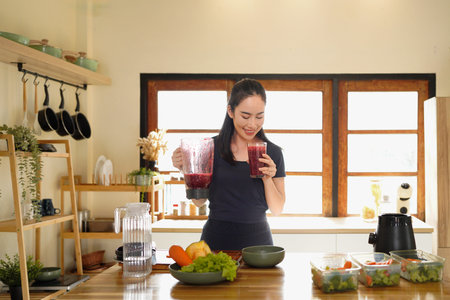 Healthy lifestyle, organic smoothie and clean eating dieting woman with fresh fruits, vegetables and...